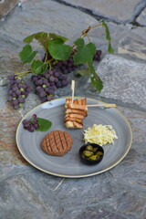 Modern style raw gourmet tartar from beef file and butter