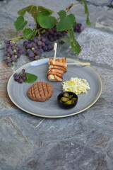 Modern style raw gourmet tartar from beef file and butter