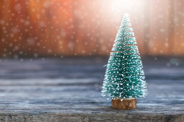 Christmas tree with space on blurred wood background, Christmas card background idea