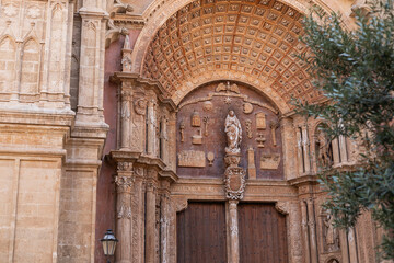 Detailed Baroque Entrance Portal of a Historic Church with Statue of the Virgin Mary, Palma de Mallorca