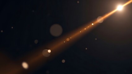 Glowing diagonal light beam with bright bokeh circles against a dark backdrop