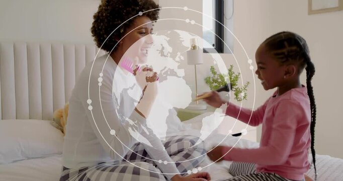 Mother raising pink comb kid trading brush mimicking song bonding family globe orbiting center
