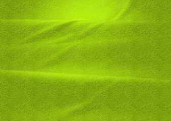 Rough textured green cloth undulation