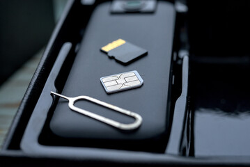 Micro sd card and sim card lies on the body camera.