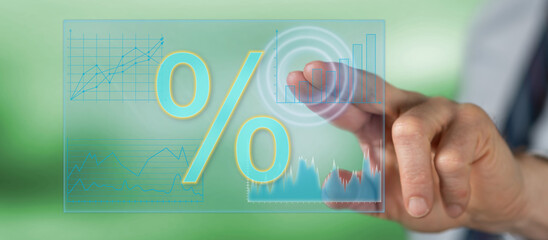 Man touching digital interest rates data