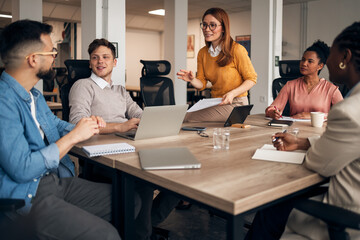 Collaborative Business Team Discussing Ideas During an Office Meeting