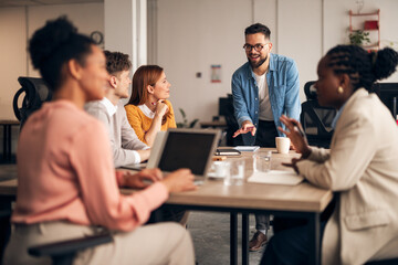 Team Collaboration During a Productive Business Meeting in a Modern Office