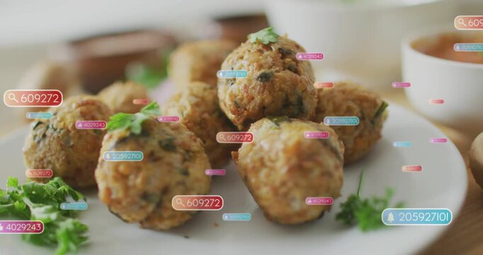 Camera shifting focus, drifting tags across while focus widening revealing fritters showing plating