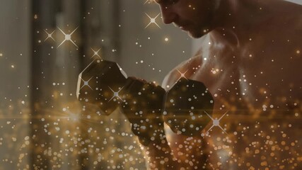 Male gripping hex dumbbell starting singlearm curl for fitness, lowering weight amid gold sparkles