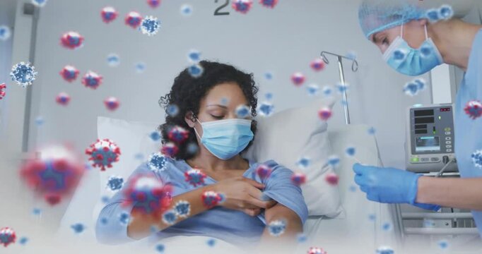 Female patient rolling sleeve after provider offering syringe, receiving jab amid viral graphics
