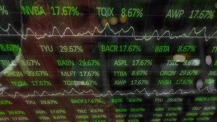 Trader leaning glass display as live feed updating green tickers percent waveform tracking markets - Powered by Adobe
