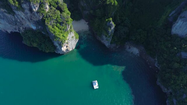 Popular places in Thailand, travel around Thailand. Poda Island, a secret lagoon behind the island. A sailing yacht near the island, a view from above.