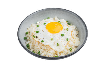 Crisp edged fried egg on soft steamed rice with sesame and pepper offering a rustic homemade breakfast full of warm flavors.