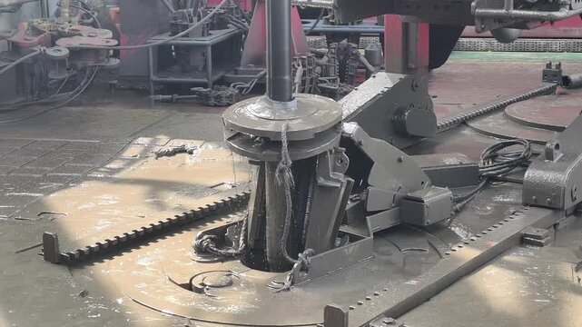Drilling rig activity - Pull of of hole drill string with oil based mud on the rig floor.
