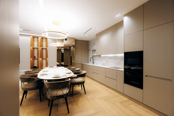 Chic kitchen area featuring luxurious finishes and inviting furniture