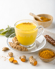 Turmeric Herbal Drink in Clear Glass – Healthy Traditional Yellow Tonic