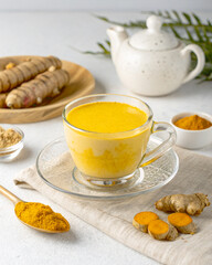 Turmeric Herbal Drink in Clear Glass – Healthy Traditional Yellow Tonic