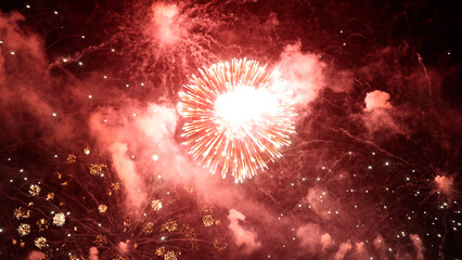 Amazing real beautiful colorful fireworks background on celebration night event for happy new year party, Abstract Multi color golden firework in the night sky