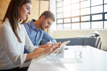 Obraz premium Tablet, planning and reading with business woman in office for internal auditor, account review and research. Coworking, risk assessment and tech with employees in agency for fraud prevention