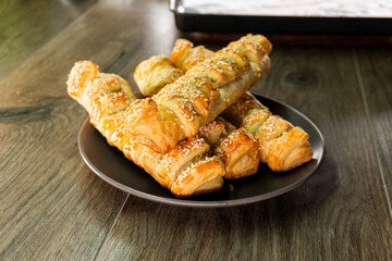 Puff pastry with strawberry jam. Jam-filled pastries. Food concept.