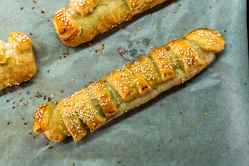 Puff pastry with strawberry jam. Jam-filled pastries. Food concept.