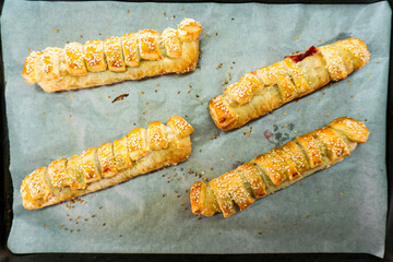 Puff pastry with strawberry jam. Jam-filled pastries. Food concept.