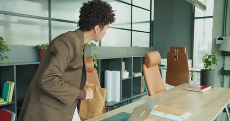 Woman at workspace sorting documents and arranging schedule