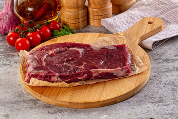 Gourmet raw rib eye steak