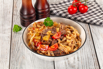 Asian udon noodles with beef