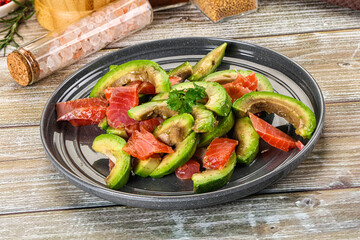 Salad with avocado and salmon
