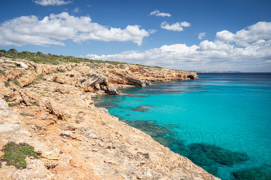 Migjorn coast with the emerald sea, near Olla de Bastons, Santanyi, Mallorca, Spain