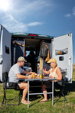 Senior couple spending leisure time during their road trip