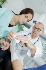 Fototapeta premium training in first aid at wrist injury