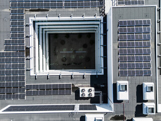 Directly above view of solar panels on building terrace