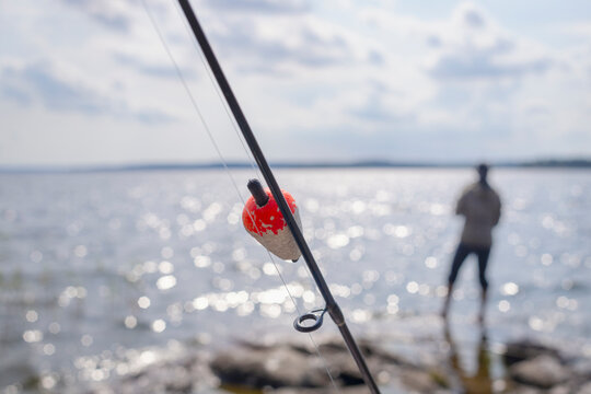 Fishing float tied on rod