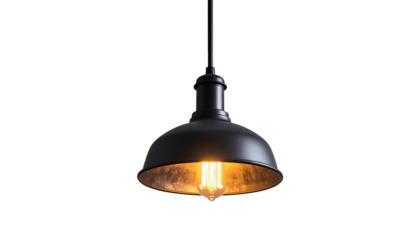 A simple black pendant light, emitting warm light, against a stark black backdrop