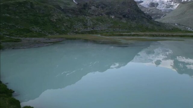 Moiry Glacier Sunrise Orbit Reveal Mirror Lake and Mountains