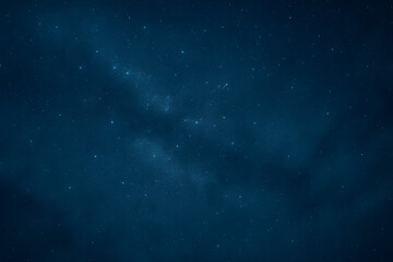 Obraz premium Starry night sky with twinkling stars in dark blue background
