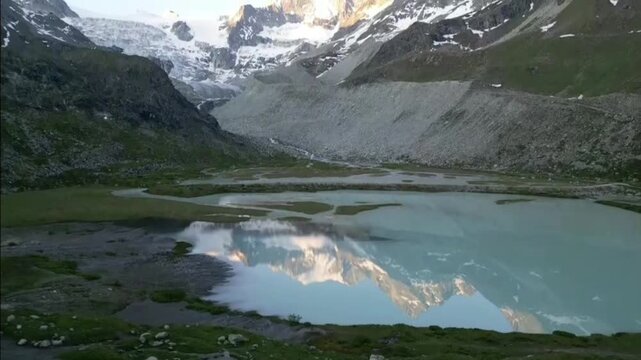 Moiry Glacier Sunrise Reverse Ascend Reveal Mirror Lake and Mountains
