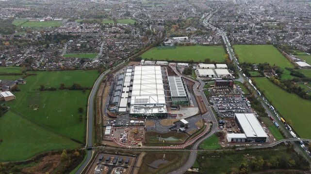Aerial drone video of a large new-build data center in Waltham Cross, UK, showcasing expanding digital infrastructure designed to meet rising AI-driven computing and cloud processing demands.