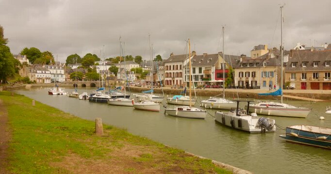 Panoramic view of yachts with the old building in the background, Saint-Goustan Port in Auray, France