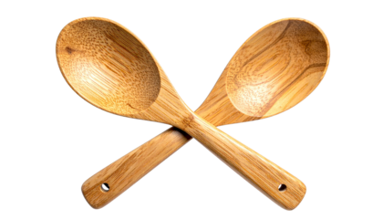 Crossed wooden serving spoon and salad server on black isolated on solid white background Png6