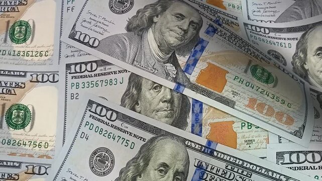 Refined visual passage moving through rippling waves of hundred dollar bills where detailed banknotes evoke investment confidence and present an exclusive money-focused financial environment