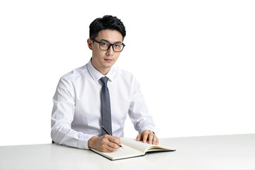 Young Asian Businessman Writing in a Notebook