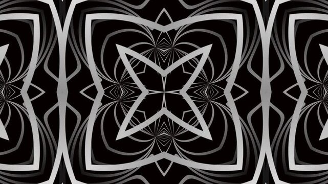 Black and white kaleidoscope pattern with bold symmetrical abstract shapes.