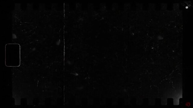 Black and White Old Film Frame Overlay with Grain, Dust, Scratches, and Vintage Film Strip Border Effect