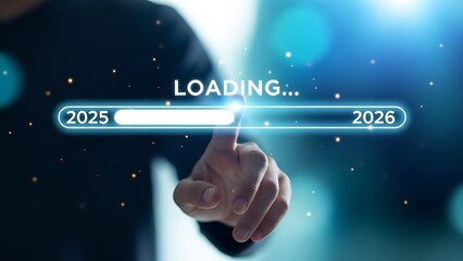 Finger touching a futuristic glowing loading bar transitioning from the year 2025 toward the beginning of 2026 symbolizing progress and future planning