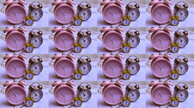 Family of Alarm clock running backwards , Turn back time for the family.	

