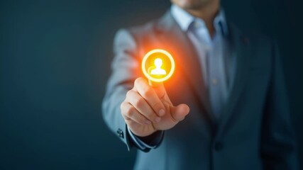Video A businessman presses a button on a conference call device, a common scene in office settings