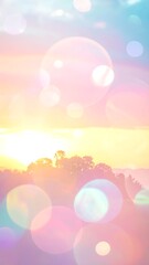 Magical pastel sky with shimmering bokeh circles illuminating a tranquil horizon over a misty landscape at sunrise or sunset.